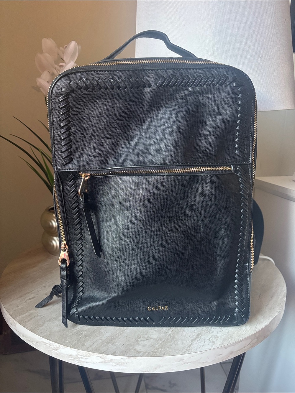 Calpak Black Backpack with Gold Hardware and Braided Trim